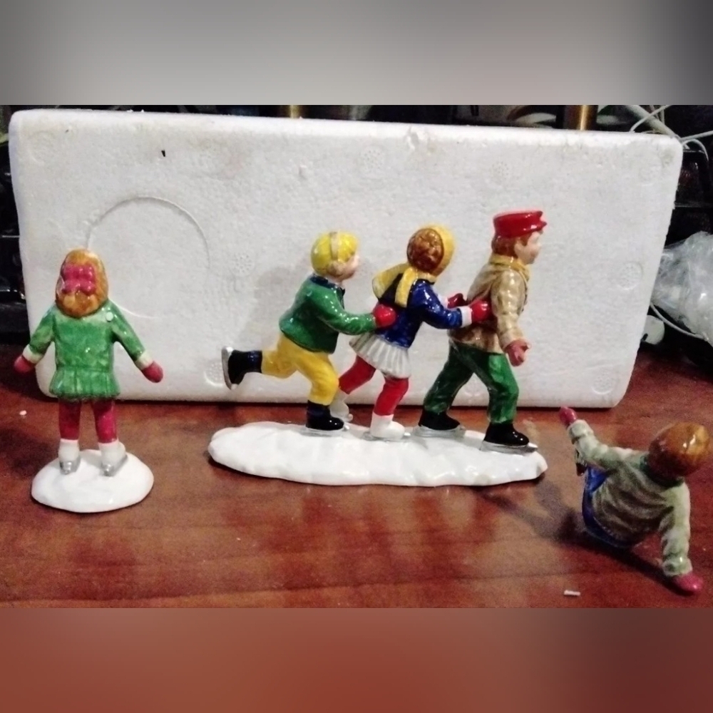 Vtg Department 56: Crack the Whip Skaters - Snow Village - set of 4.